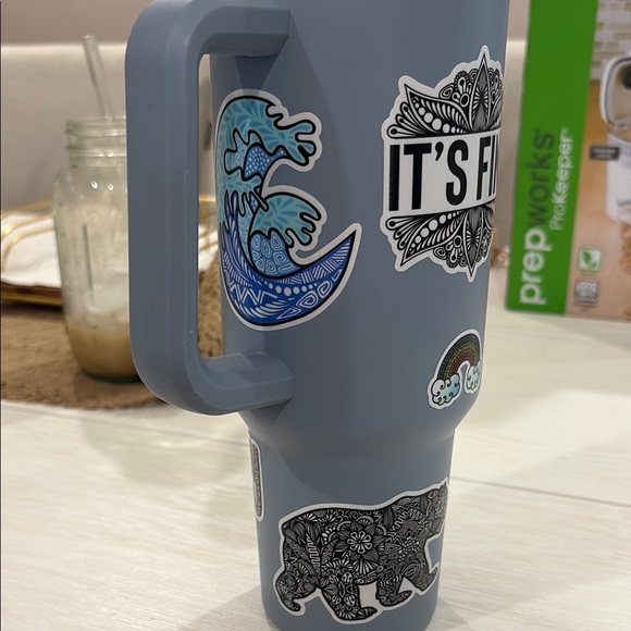 Stanley Blue Travel Mug with Vibrant Stickers - Picture 3 of 5